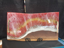 Load image into Gallery viewer, Live Edge Maple, rich browns and warm golds food safe epoxy covering 90% of wood in a wave pattern white, clear, medium reds, golds with brass handles.
