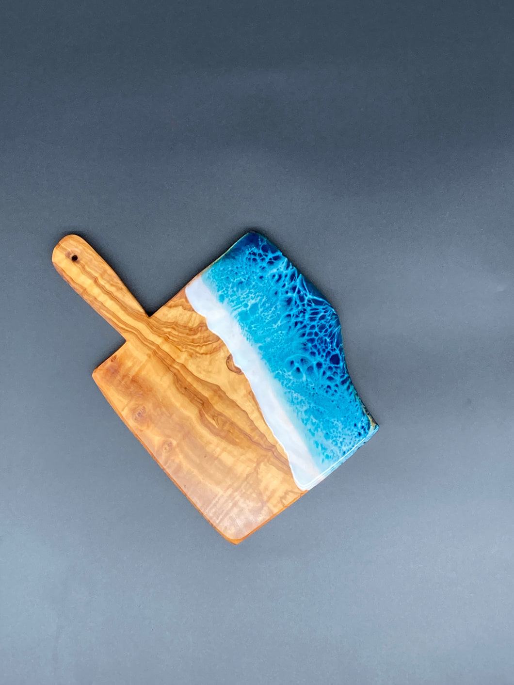 Small Rustic Olive Wood Paddle in Ocean